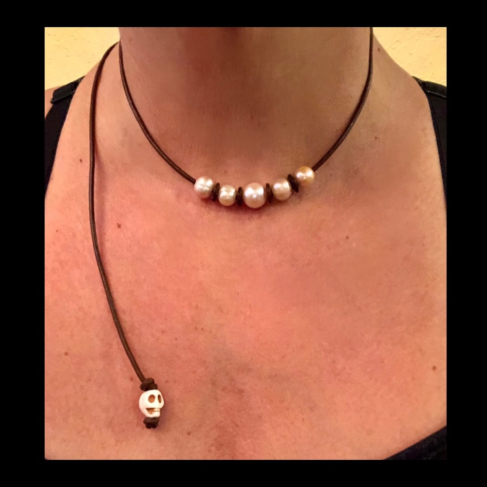 Genuine pearl with skull necklace.